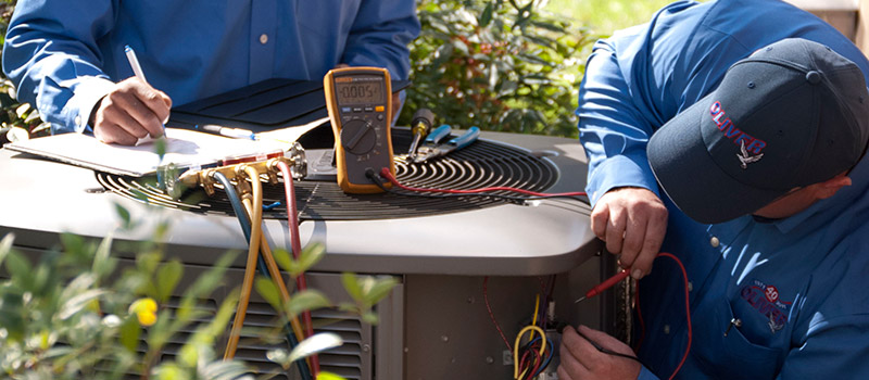 HVAC Contractor in Broken Arrow OK repairing system